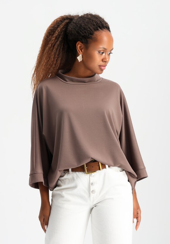 Блуза из плотного трикотажа шир.  580, рис. 7