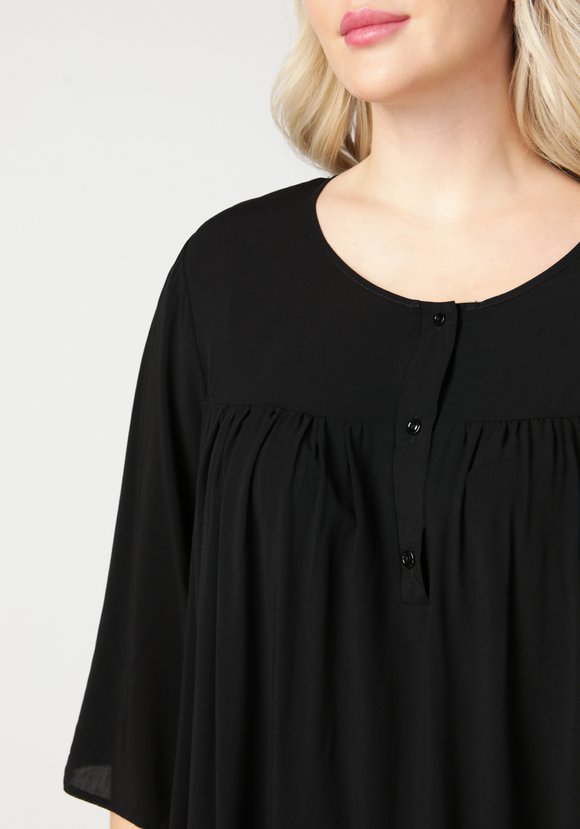 Блуза свободного кроя на пуговичках шир.  580, рис. 24