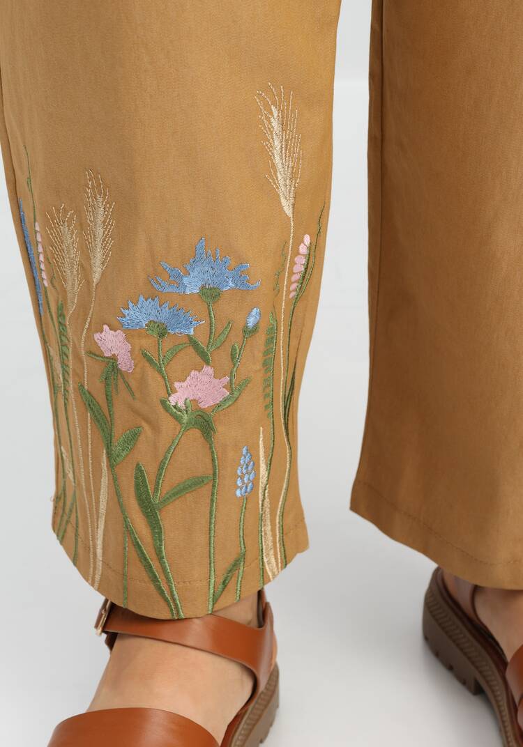 Брюки с вышивкой по низу шир.  750, рис. 7