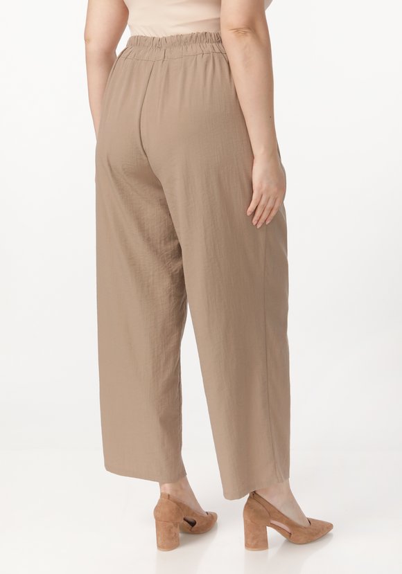 Брюки с защипами на поясе шир.  580, рис. 2