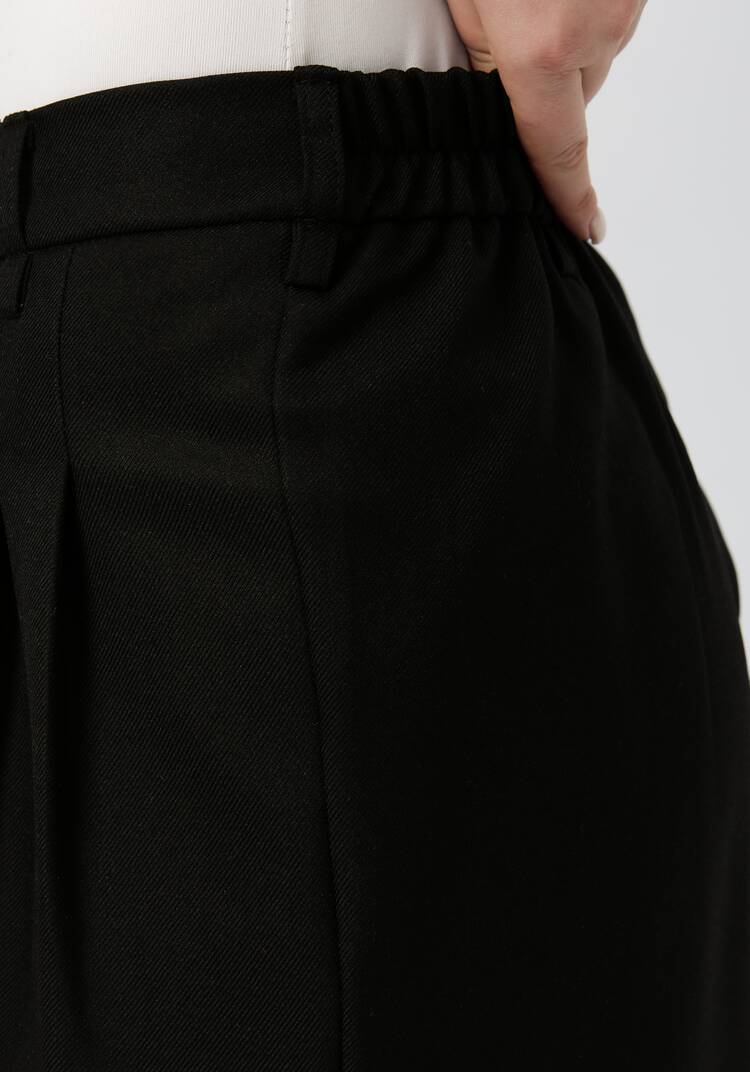 Брюки свободного силуэта с защипами шир.  750, рис. 10