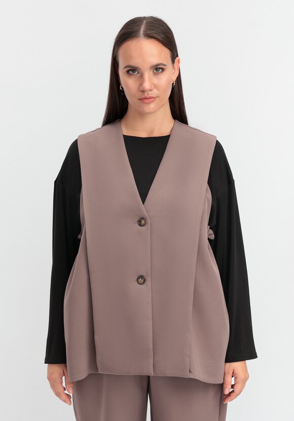 Жилет однобортный на пуговице шир.  580, рис. 12