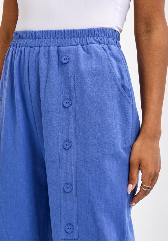 Брюки с декоративной планкой и карманами шир.  580, рис. 29