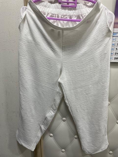 

Брюки из жатки молочного цвета