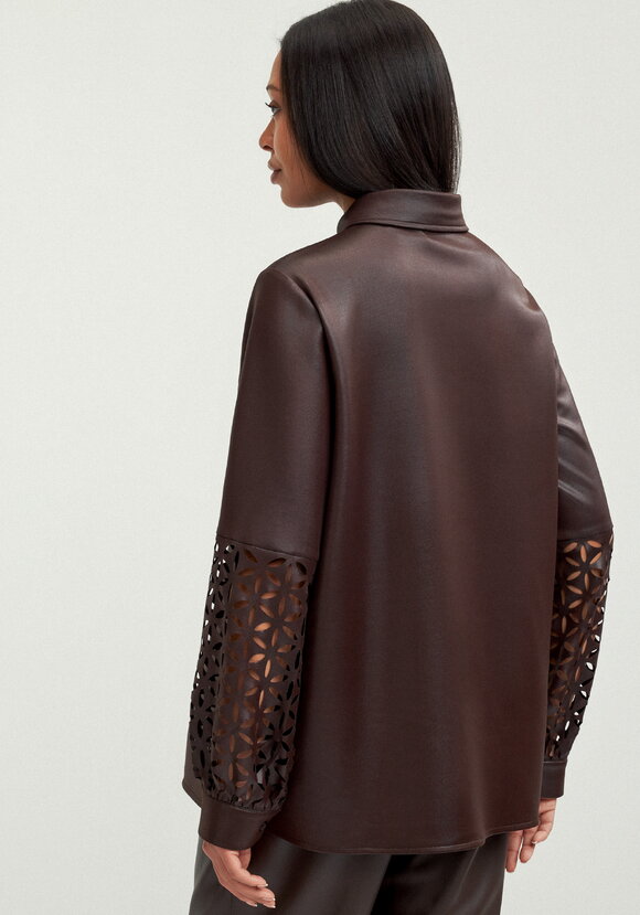 Блуза с перфорацией на рукавах шир.  580, рис. 10