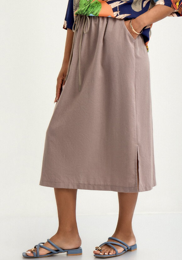 Юбка изо льна свободного кроя шир.  580, рис. 9