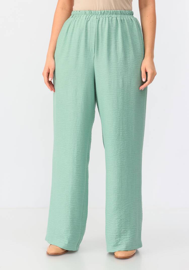 Брюки свободного кроя на резинке по поясу шир.  750, рис. 13