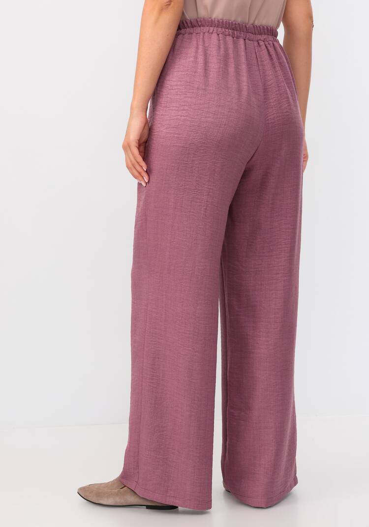 Брюки свободного кроя на резинке по поясу шир.  750, рис. 19