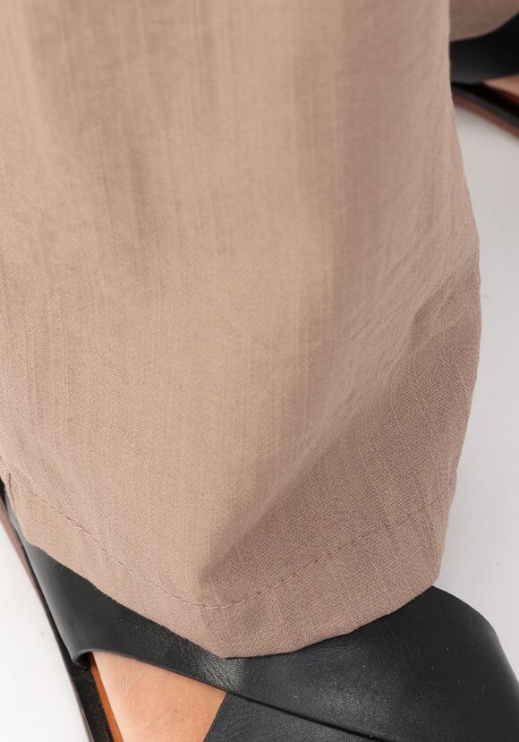 Брюки свободного кроя с защипами на поясе шир.  580, рис. 14