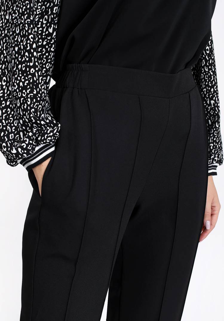 Брюки с декоративными отстрочками шир.  750, рис. 12