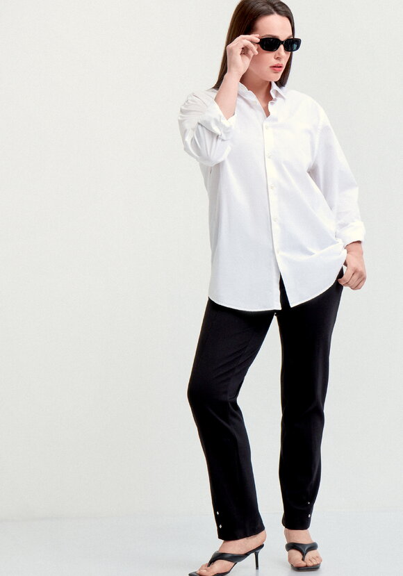 Брюки с эффектом утяжки и декором по низу шир.  580, рис. 7