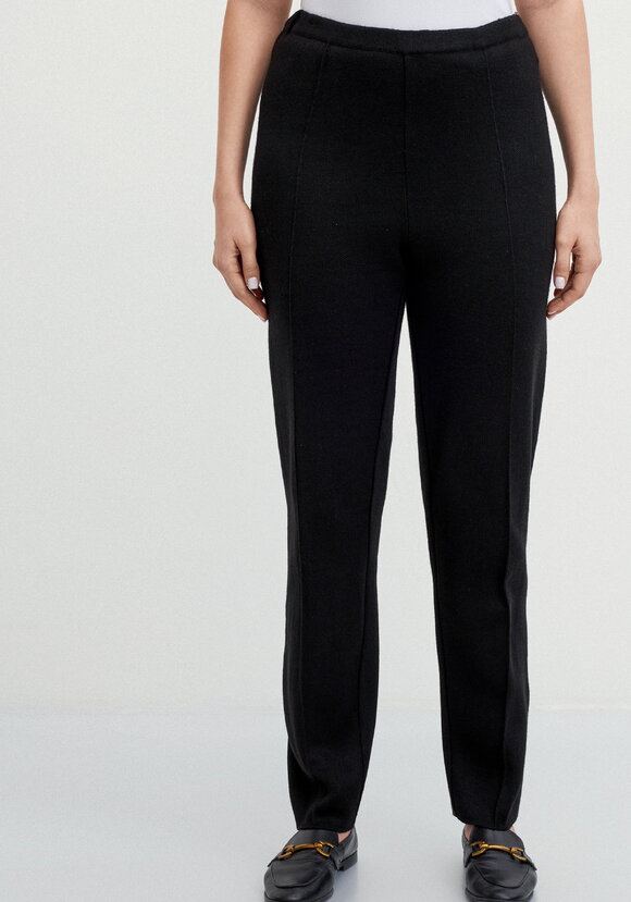 Брюки прямые зауженные книзу на резинке шир.  580, рис. 4