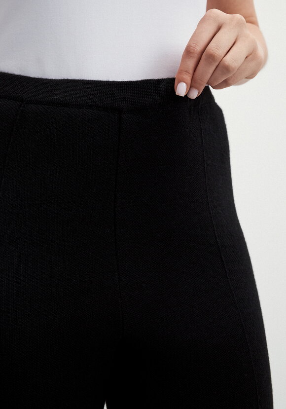 Брюки прямые зауженные книзу на резинке шир.  580, рис. 5