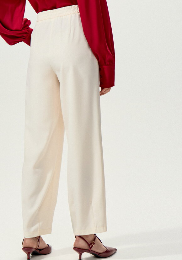 Брюки со складками свободные шир.  580, рис. 9