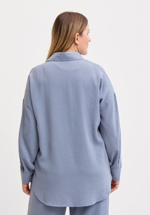 Рубашка свободного кроя с ассиметричным низом шир.  580, рис. 27