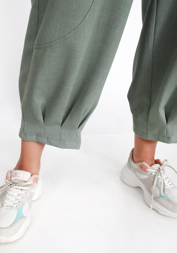 Брюки с защипами по низу шир.  580, рис. 12