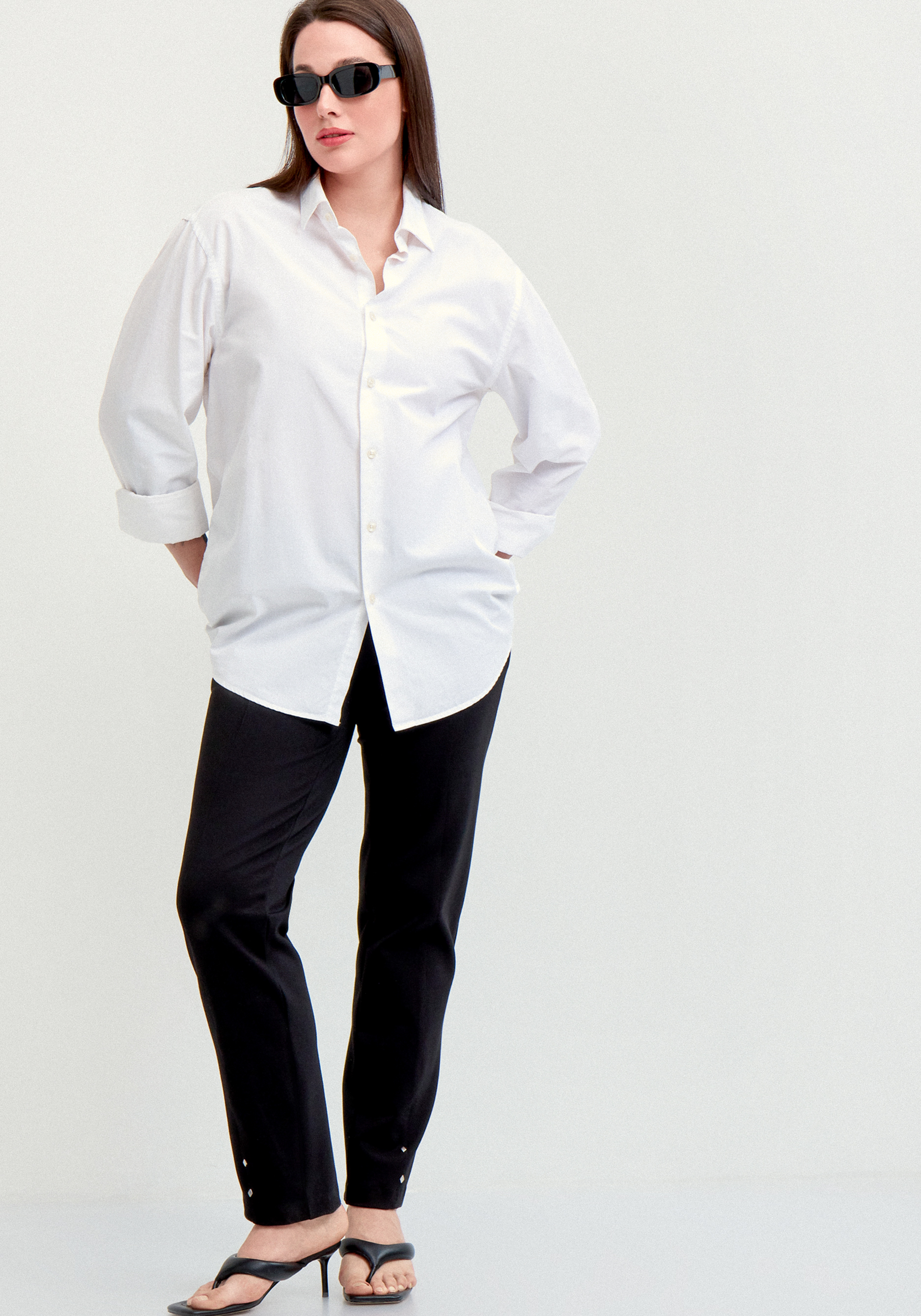 Брюки с эффектом утяжки и декором по низу 2899₽