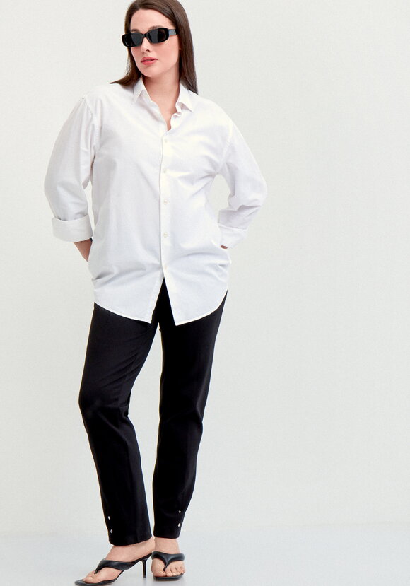 Брюки с эффектом утяжки и декором по низу шир.  580, рис. 1