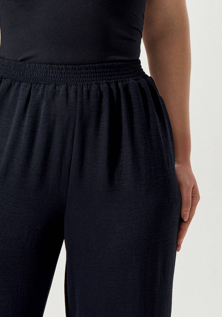 Брюки свободные на резинке по поясу шир.  750, рис. 21