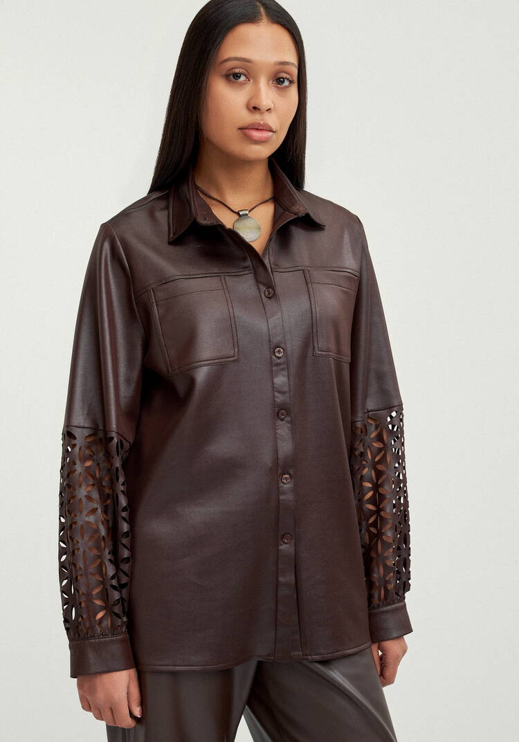 Блуза с перфорацией на рукавах шир.  750, рис. 15