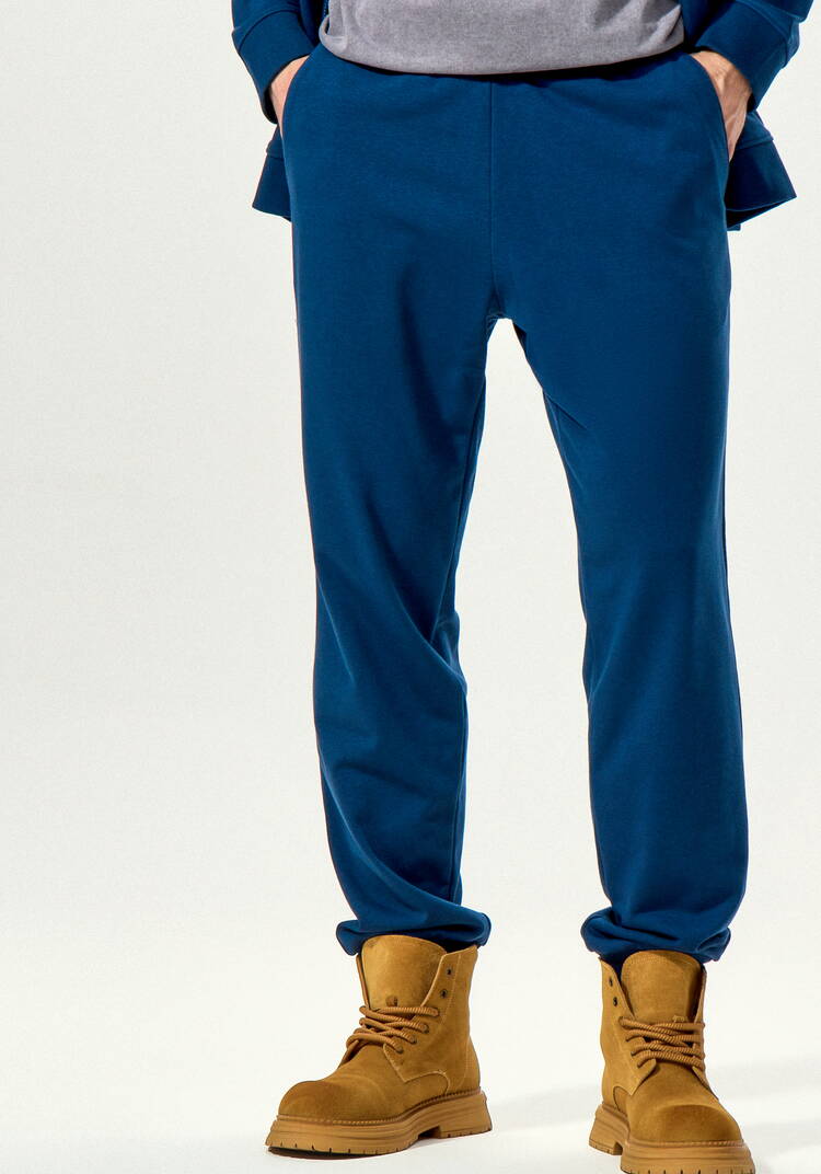 Брюки с карманами и манжетами по низу шир.  750, рис. 25