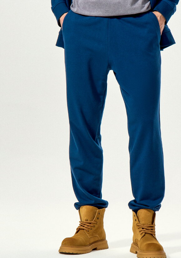 Брюки с карманами и манжетами по низу шир.  580, рис. 25