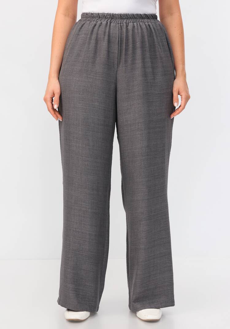 Брюки свободного кроя на резинке по поясу шир.  750, рис. 42