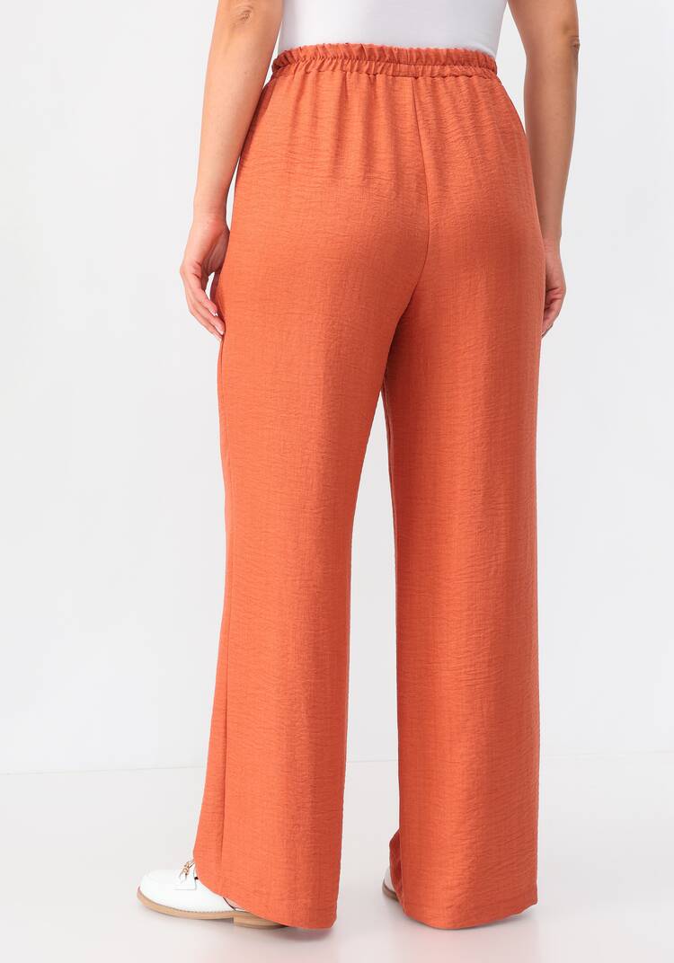 Брюки свободного кроя на резинке по поясу шир.  750, рис. 26