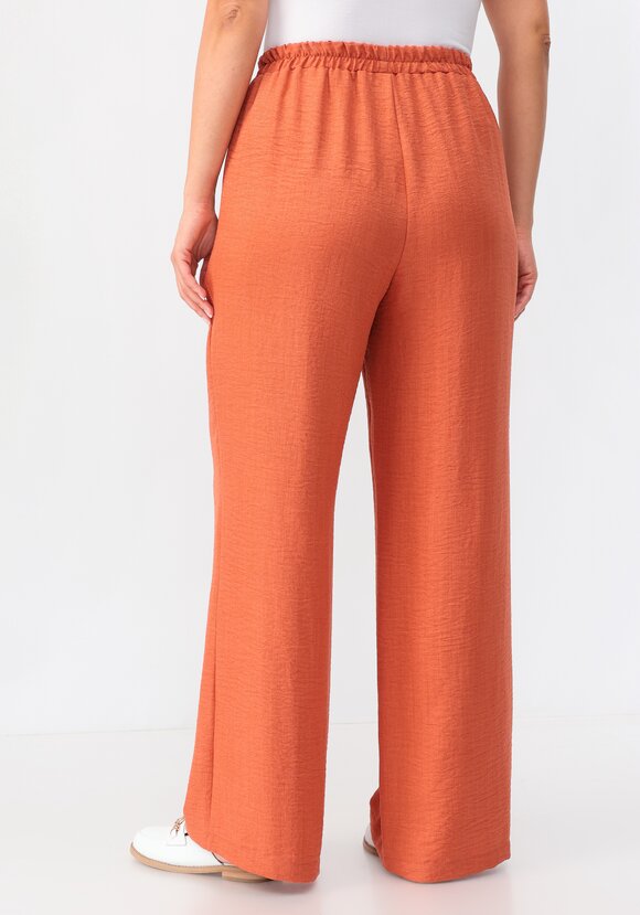 Брюки свободного кроя на резинке по поясу шир.  580, рис. 26