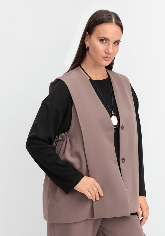 Жилет однобортный на пуговице шир.  580, рис. 16