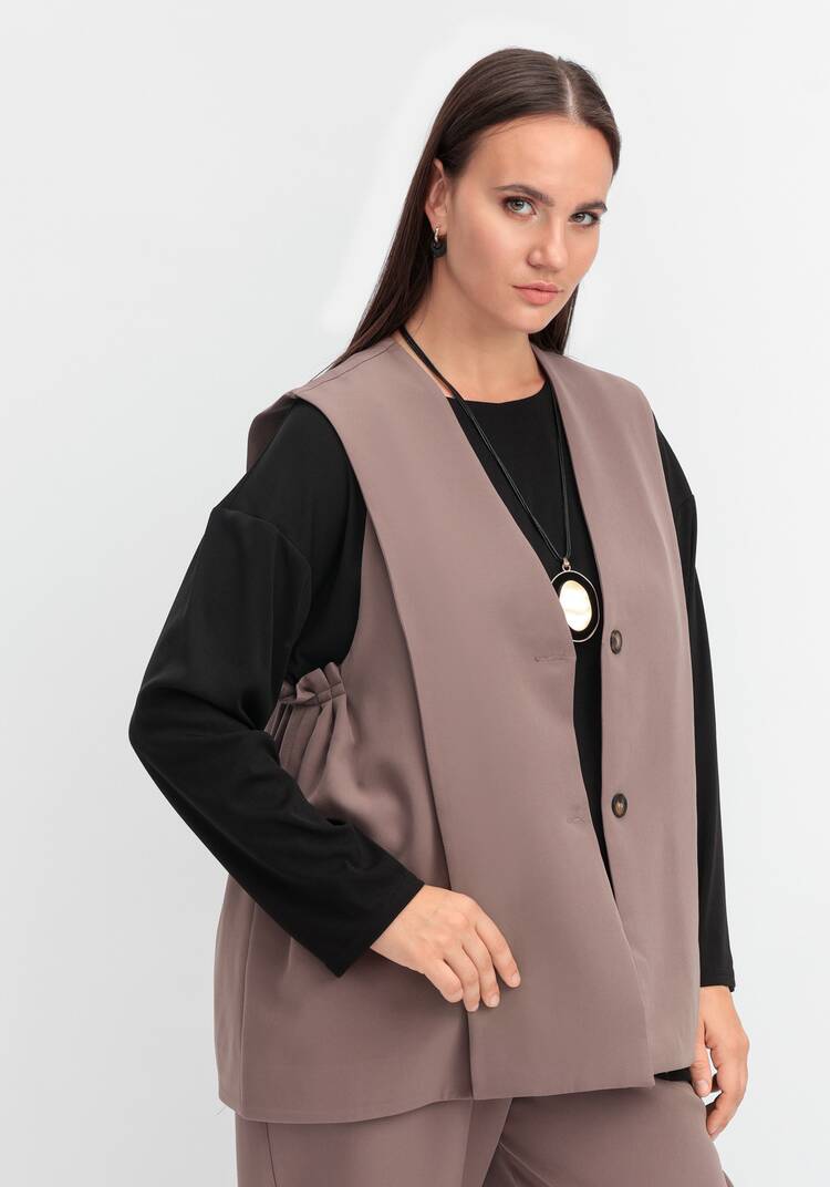 Жилет однобортный на пуговице шир.  750, рис. 16