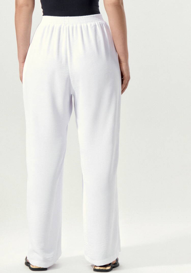 Брюки свободные на резинке по поясу шир.  750, рис. 10