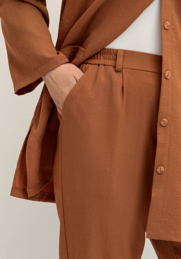 Брюки прямого кроя на резинке по поясу шир.  750, рис. 26