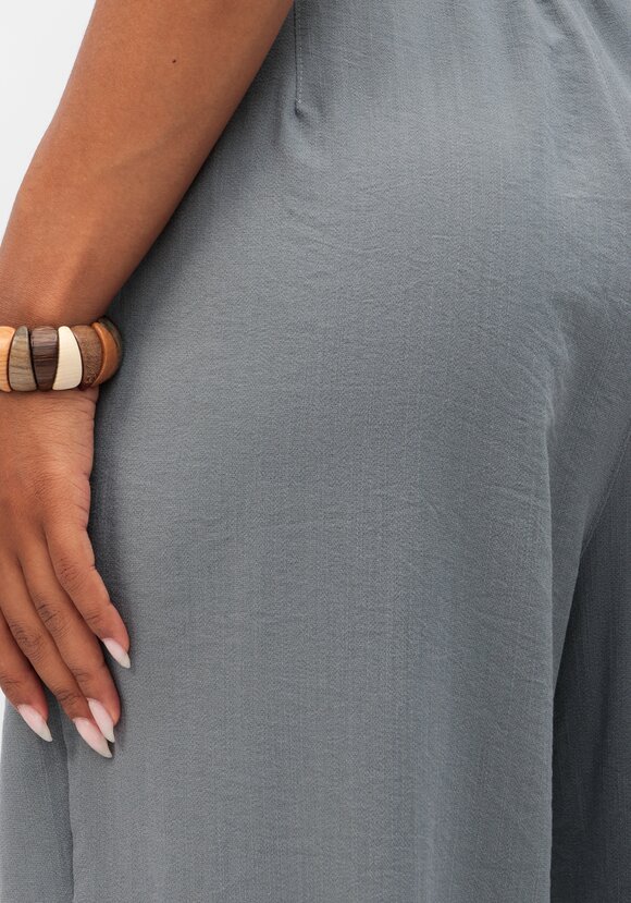 Брюки свободного кроя с защипами на поясе шир.  580, рис. 6