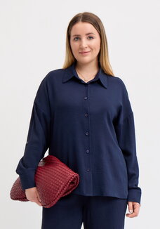 Рубашка свободного кроя с ассиметричным низом