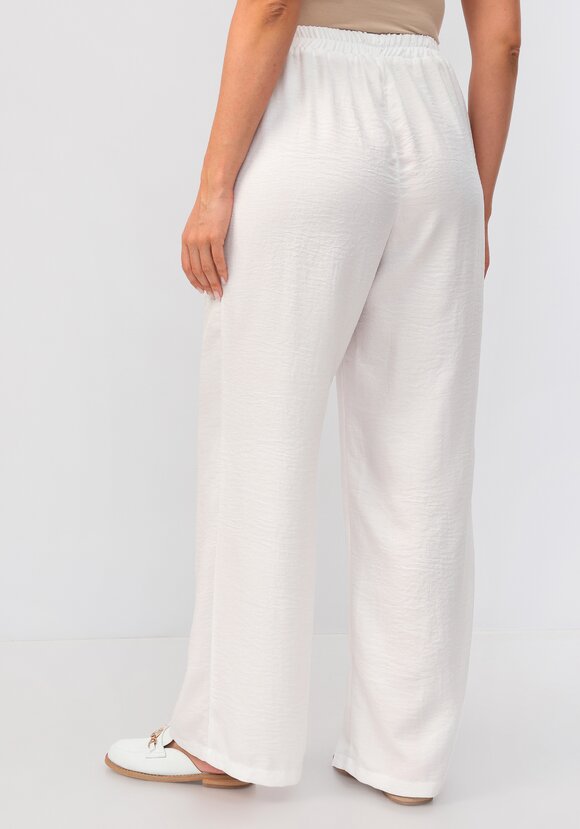 Брюки свободного кроя на резинке по поясу шир.  580, рис. 34