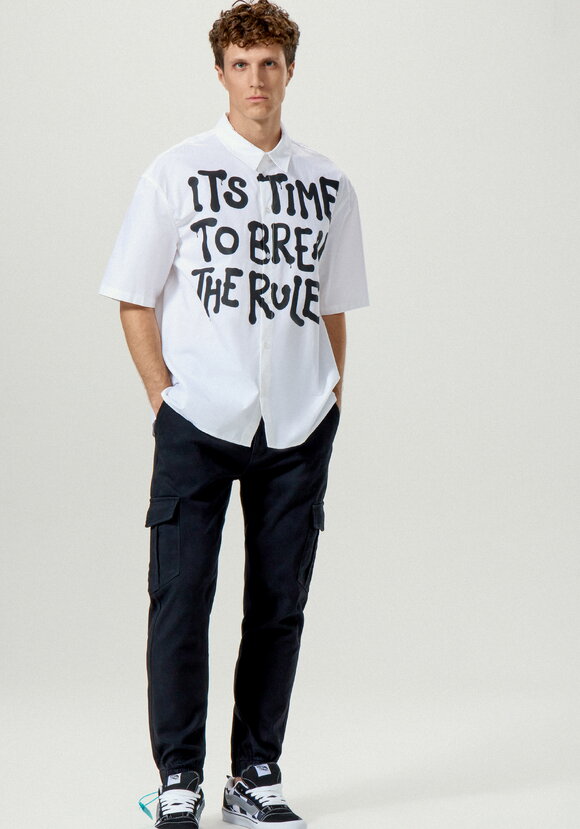 Брюки карго с накладными карманами по бокам шир.  580, рис. 1