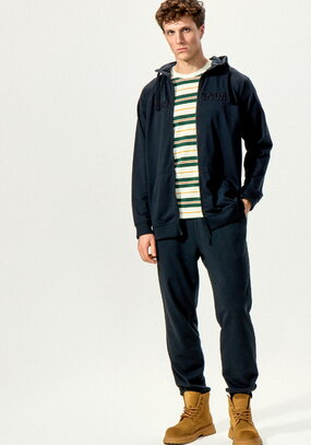 Брюки с карманами и манжетами по низу