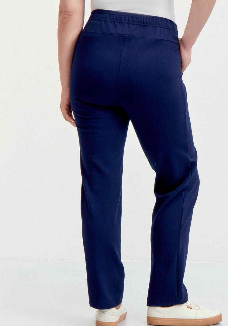 Брюки с эффектом утяжки и декором по низу шир.  750, рис. 11