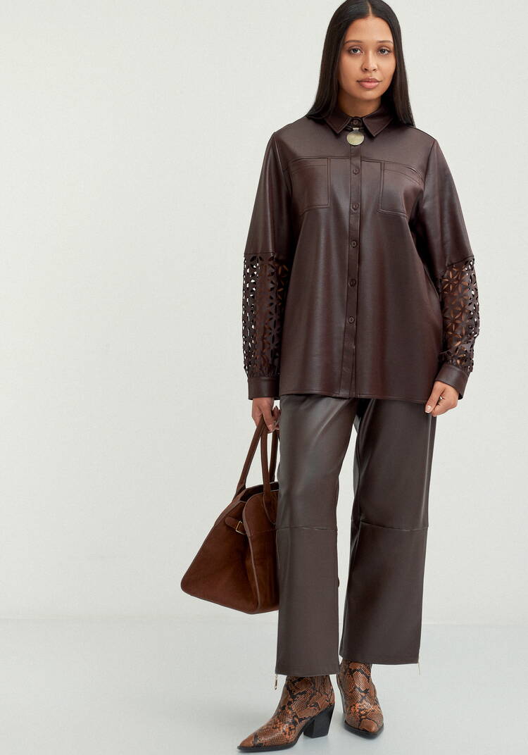 Блуза с перфорацией на рукавах шир.  750, рис. 9