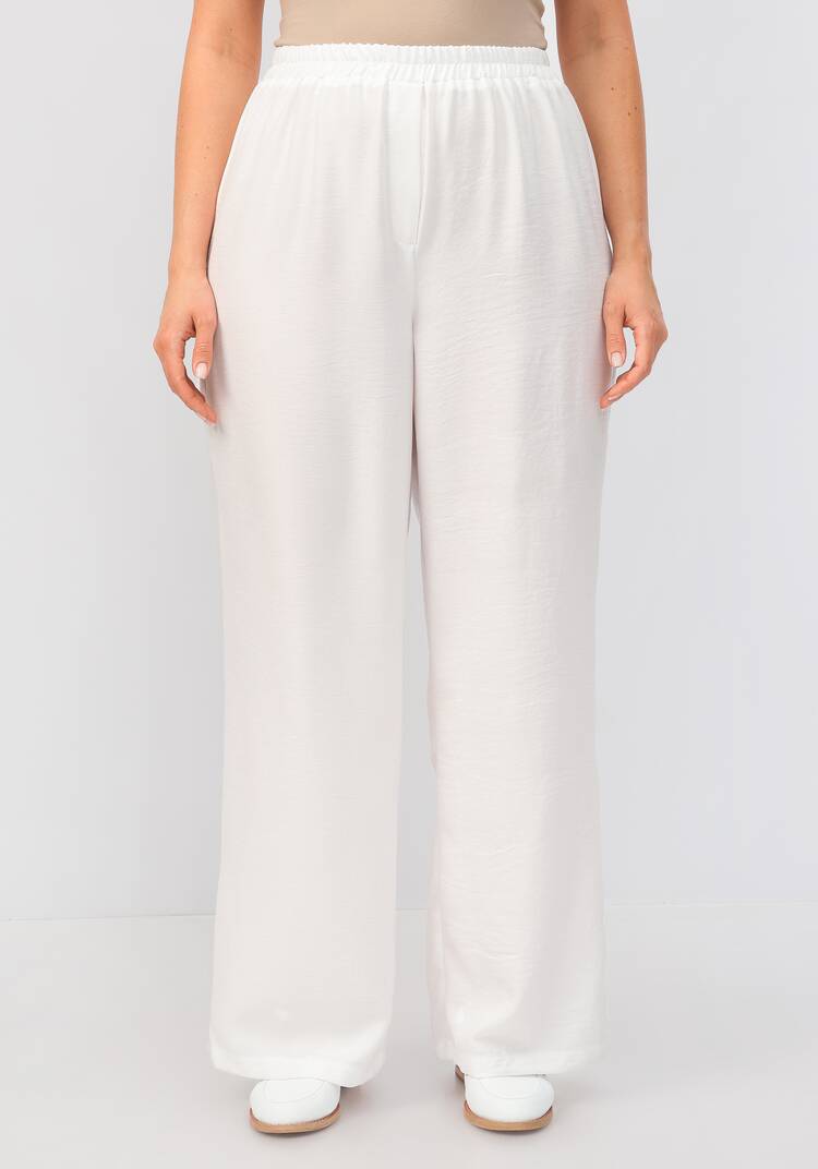 Брюки свободного кроя на резинке по поясу шир.  750, рис. 35