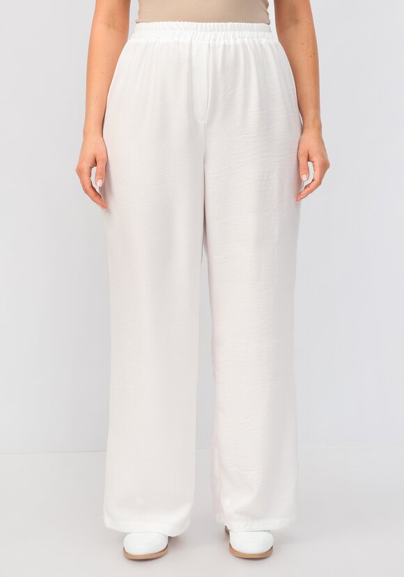 Брюки свободного кроя на резинке по поясу шир.  580, рис. 35