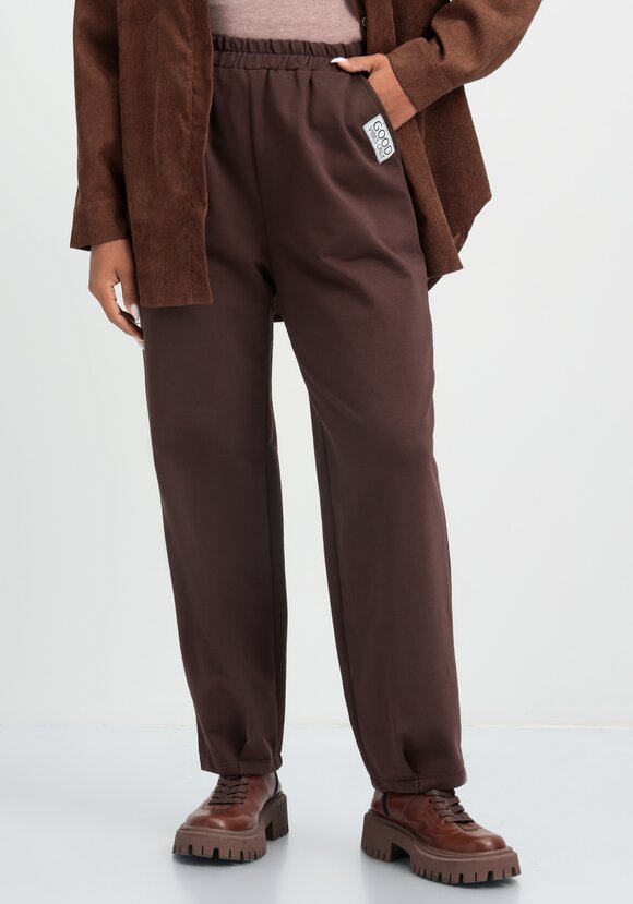 Брюки трикотажные с защипами по низу шир.  580, рис. 23