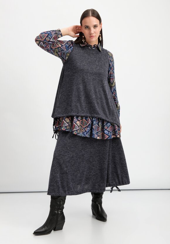 Жилет А-силуэта с кулиской по низу шир.  580, рис. 23