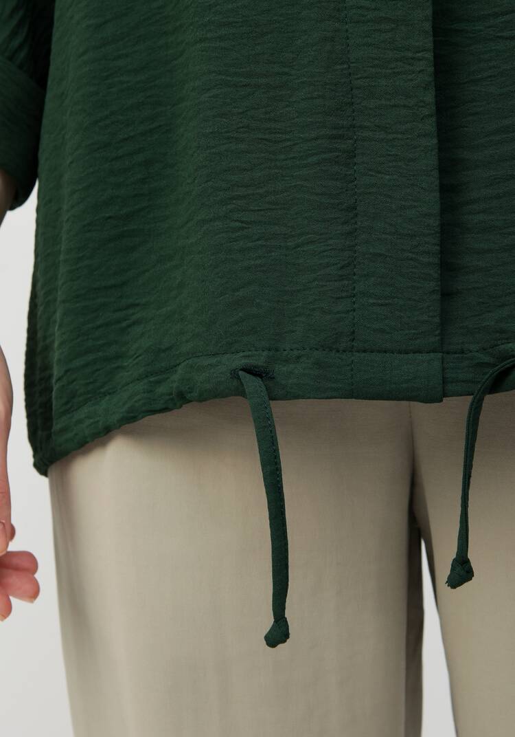 Блуза с патой на рукавах шир.  750, рис. 34