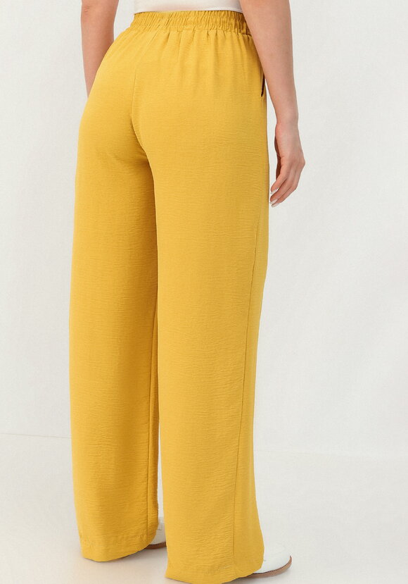 Брюки свободного кроя с боковыми карманами шир.  580, рис. 32