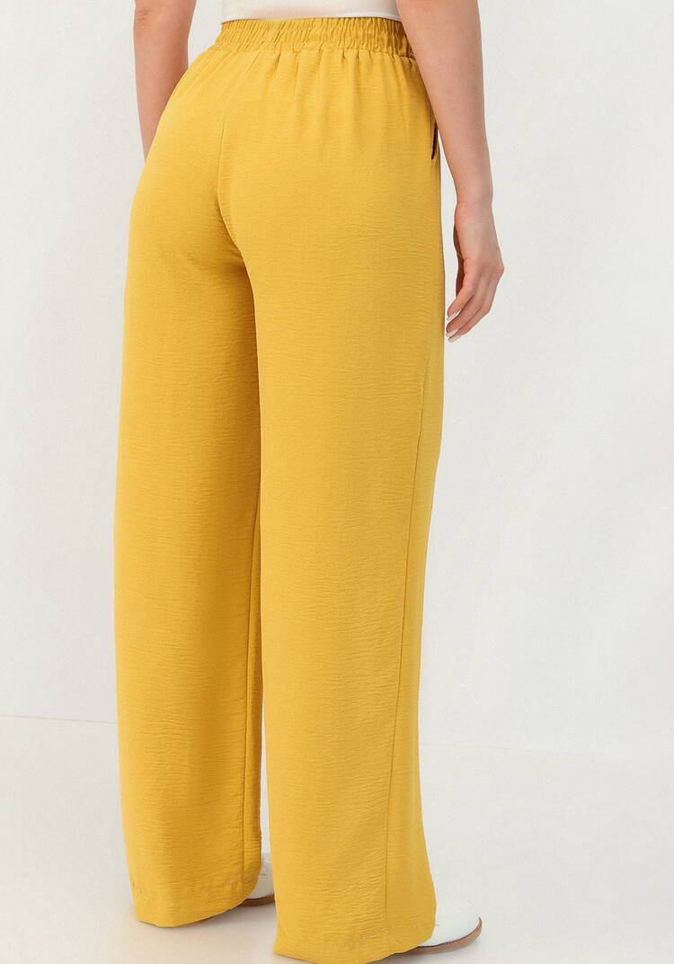 Брюки свободного кроя с боковыми карманами шир.  750, рис. 32