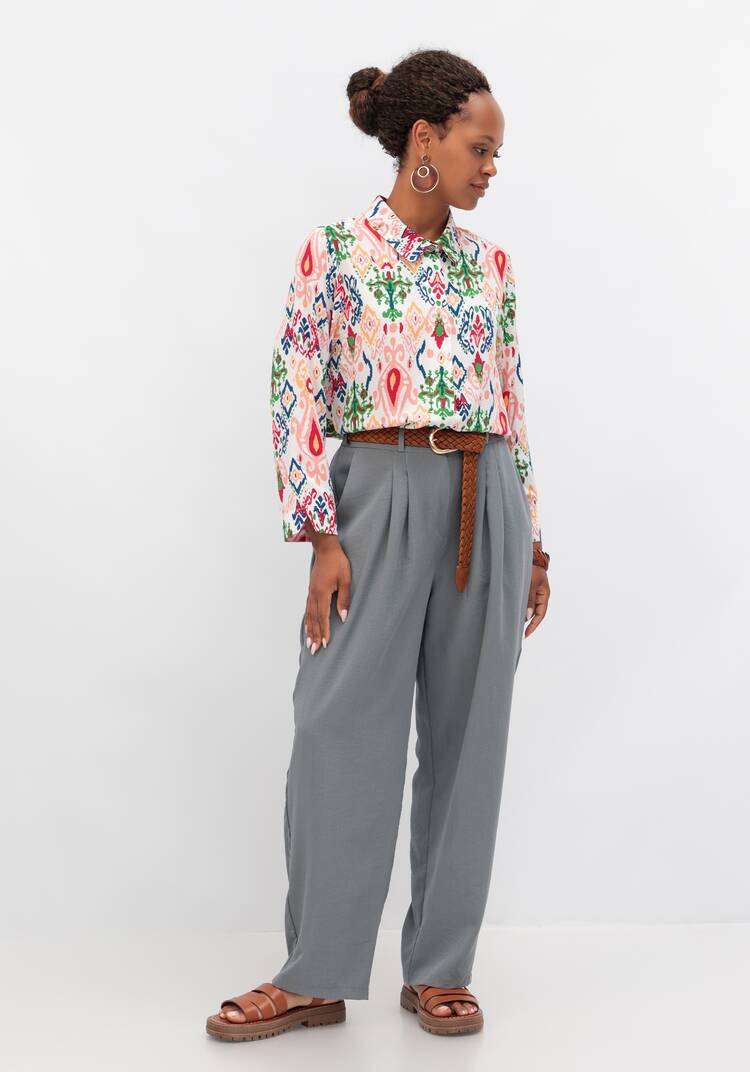 Брюки свободного кроя с защипами на поясе шир.  750, рис. 7