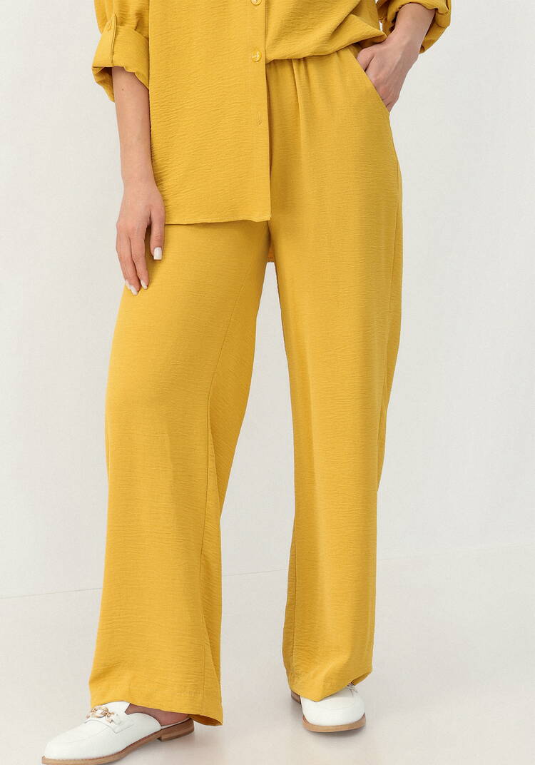 Брюки свободного кроя с боковыми карманами шир.  750, рис. 31