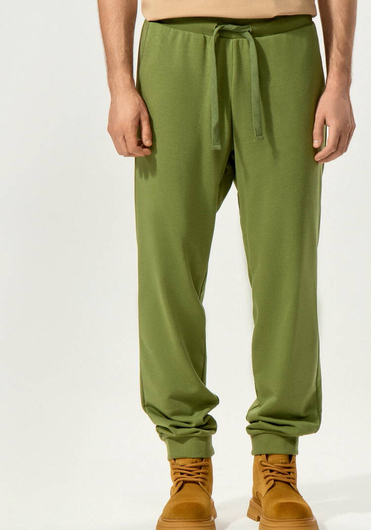 Брюки с карманами и манжетами по низу шир.  750, рис. 19